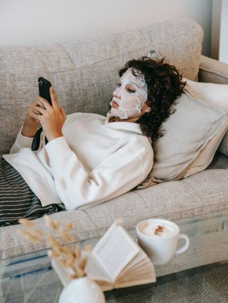 a woman typing on a smartphone