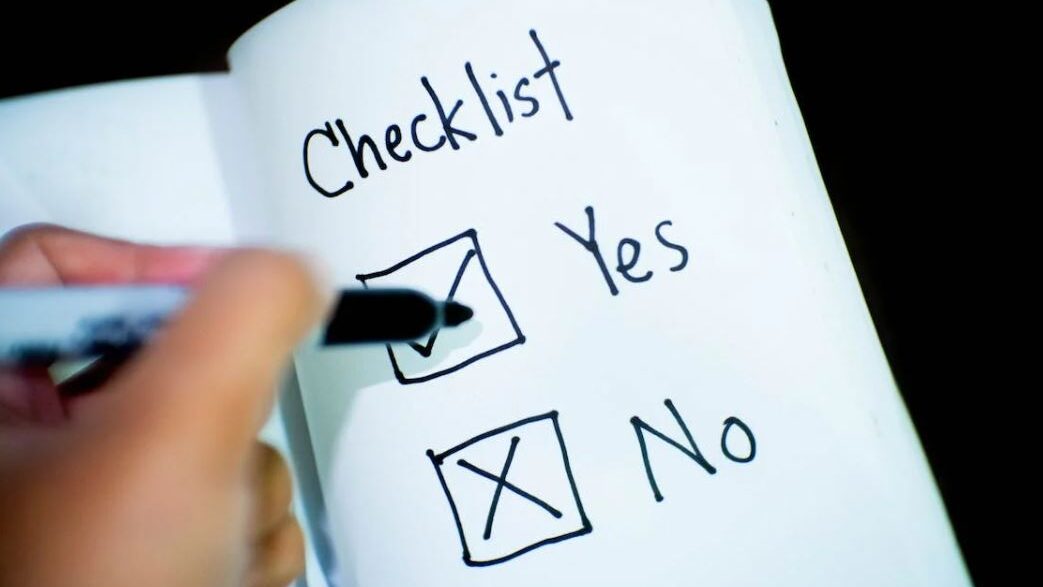 Close-up of a handwritten checklist with options "Yes" and "No," with "Yes" checked.